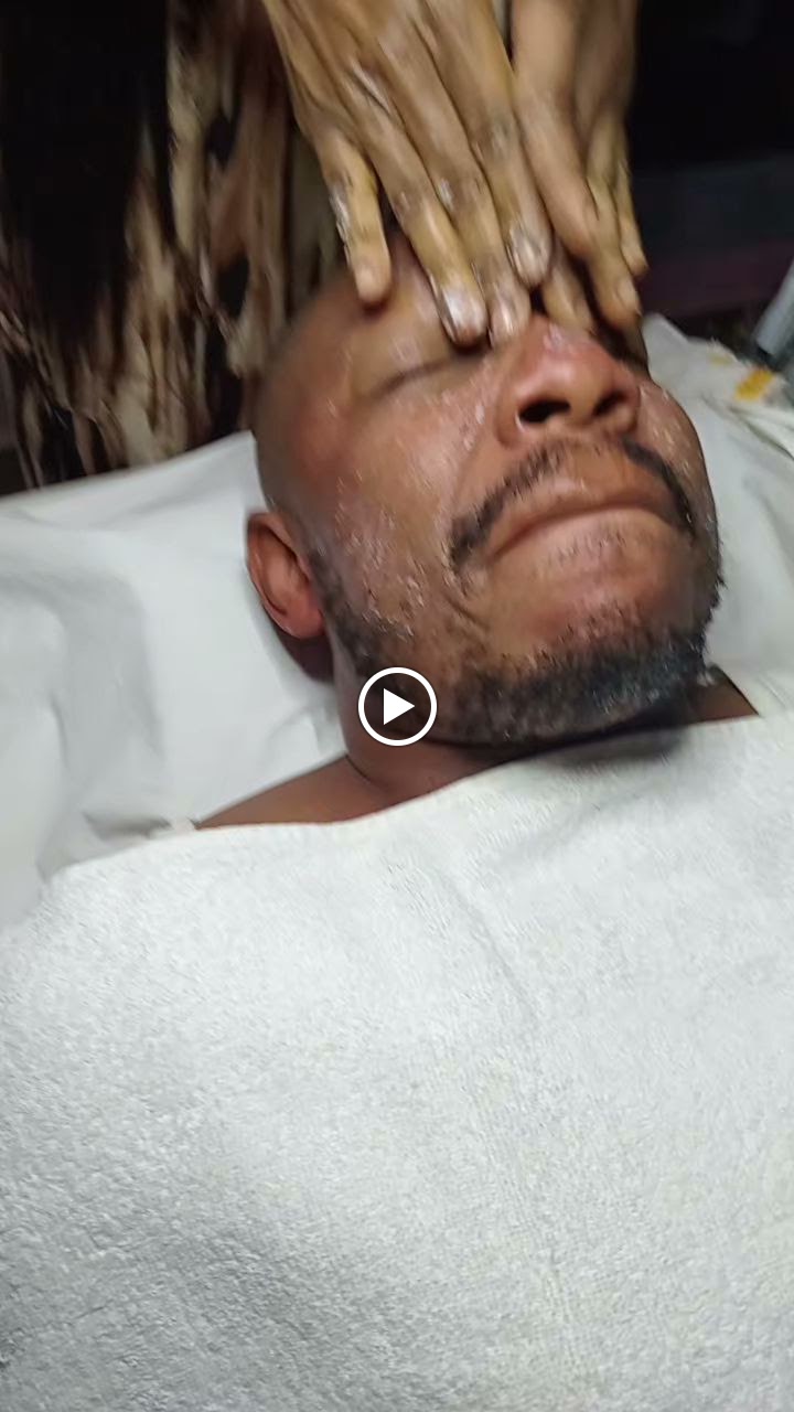 Facial massage for a male client at Shosho Beauty Spa