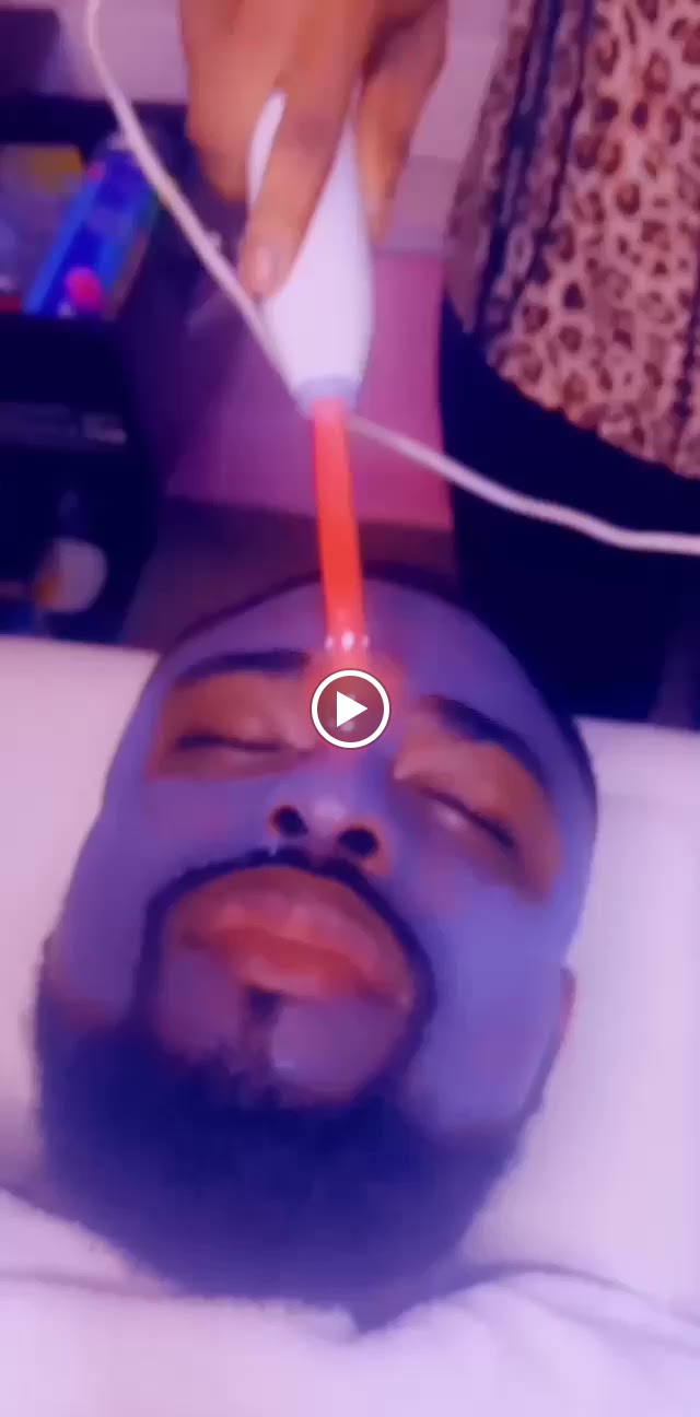 LED light therapy during a facial
